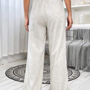 SHEIN EZwear Pantalon de jogging casual à taille coulissante et jambes évasées pour femmes, de couleur noire