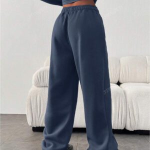 Pantalon de jogging ample et décontracté pour femmes de couleur unie avec cordon de serrage à la taille et poches