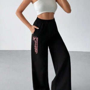 SHEIN Pantalon de survêtement droit à longues jambes effet stretch asymétrique à la taille imprimé Brooklyn