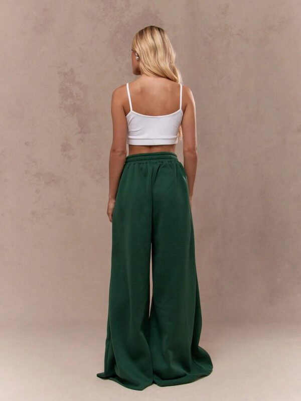 MISSGUIDED Pantalon de survêtement à jambes extra larges et longues, style universitaire et athlétique, avec logo flammé Varsity NY, taille élastique, taille haute, pour l'automne et l'hiver, pour le sport et le détente – Image 3