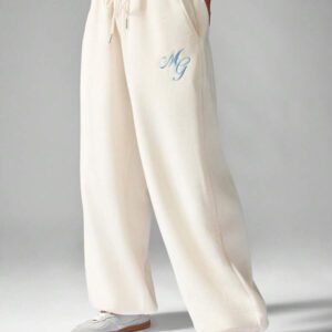 MISSGUIDED Pantalon de jogging ample à jambes larges avec imprimé de lettre monogramme, taille élastique avec cordon de serrage. Bas de survêtement d'hiver décontracté et streetwear