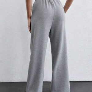 RueChic Pantalon à jambes larges avec détails de perles de couleur unie