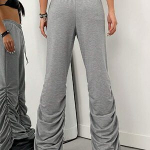 Flirla Pantalon de survêtement décontracté pour femmes à taille élastique, plissé et évasé, de couleur unie