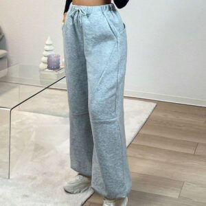 Pantalon de survêtement tricoté à taille basse avec motif patchwork et design unique d'ourlet