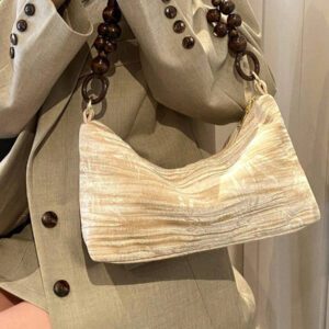 Sac à épaule en suédine en forme de nuage, sac en forme de dumpling à la mode avec un design unique, sac à main en daim, s'assortissant parfaitement aux tenues d'automne pour femmes