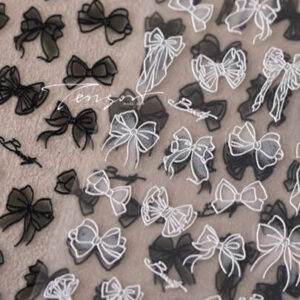 Autocollants 3D en gaufrage en noir et blanc en dentelle avec nœud Nail Art - Auto-adhésifs sur le thème de dessins animés pour manucures à bricoler, étuis de téléphone et journaux